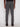 A person in Projek Raw BASTIEN-GREY tailored fit plaid drawstring pants and black shoes stands facing away from the camera against a plain light background.