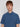 A young man with light brown hair and a neutral expression wears the Projek Raw ADRIAN-BLUE short-sleeve travel shirt, featuring 4-way stretch fabric and a chest pocket holding a black pen. The plain light background highlights its easy-to-pack style.