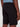 A person, shown from the back and waist down, wears Projek Raws ANTHONY-BLACK shorts with a back pocket and a blue shirt; their hand rests relaxed at their side.
