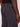 A close-up of a person wearing Projek Raw NATHANIAL-DARK CHARCOAL pants, highlighting the back pocket area with visible stitching and a small rectangular label above the pocket.