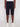 A person wearing Projek Raw ISMAËL-NAVY cargo shorts and white sneakers stands against a plain white background, with only their legs and lower torso visible.