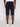 A person shown from the back, standing against a plain light background, wearing Projek Raw ISMAËL-NAVY cargo shorts and white sneakers.