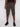 A person wearing Projek Raw’s JACOBI-OLIVE cargo shorts stands against a plain light background. Only the lower half of the body is visible.