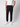 Only the lower half of a person is visible, showcasing PROJEK RAW Men’s Stretch Bungee Cargo Jogger with pockets, paired with a white short-sleeve shirt and white sneakers against a plain background.