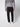 A person stands facing away, showcasing the back of a gray sweater paired with PROJEK RAW Men’s Canvas Bungee Pull-on Cargo Joggers and white sneakers against a plain background.