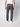A person faces away in a white T-shirt, white sneakers, and PROJEK RAW Men’s Canvas Bungee Pull-on Cargo Jogger with back and side pockets, set against a plain light background.