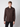 A young man with short light brown hair wears a PROJEK RAW Mens Long Sleeve Casual Dress Shirt in dark brown with two chest pockets and black pants, standing against a plain light gray background. The shirt is made from easy-care fabric for comfort.