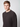 A young man with short light brown hair wears a PROJEK RAW Mens Long Sleeve Henley Top and faces slightly left against a plain light background.