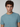 A young man with short curly brown hair and light skin wears a PROJEK RAW Mens Short Sleeve Crew Neck T-shirt, looking directly at the camera with a neutral expression against a plain background.