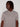 A person with medium-length dreadlocks wears the Projek Raw AARON-GREY short-sleeve polo, looking slightly to the side against a plain white background.