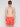 A shirtless person in Projek Raw’s BRUNO-PAPAYA red swim trunks with a palm tree pattern and black sunglasses stands against a plain white background.