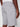 A person is shown from the back wearing Projek Raws GUSTAVE-ALLOY light gray shorts with welt back pockets and a white shirt, their right arm relaxed at their side.