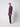 A young man stands sideways against a plain light gray background, wearing a textured purple zip-up sweater and PROJEK RAW Mens Bungee Relaxed Chino Pant with white platform sneakers.
