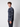 A young man with curly hair stands in profile against a plain light background, wearing the PROJEK RAW Mens Plaid Corduroy Long Sleeve Shirt and dark pants.