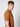 A young man with short light brown hair wears a PROJEK RAW Mens Short Sleeve Crewneck T-shirt, standing sideways and looking over his shoulder at the camera against a plain light background.