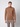 A young man with short light brown hair wears the PROJEK RAW Mens Long Sleeve Turtleneck Sweater and light brown checkered pants, standing against a plain light gray background and looking straight at the camera with a neutral expression.