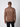 A man with short hair, seen from behind, wears a PROJEK RAW Mens Cable Knit Mock Neck Sweater and black pants, standing against a plain white background.