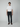 A person stands facing forward against a plain light gray background, wearing a white T-shirt, brown shoes, and PROJEK RAW MENS 5-POCKET ATHLETIC FIT JEAN made with stretch fabric.