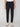 A person, shown from the waist down, wears PROJEK RAW MENS 5-POCKET SOLID BUNGEE CHINO PANT in dark navy and white sneakers, standing against a plain light background.