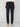 A person is shown from the back against a plain light background wearing PROJEK RAW MENS SOLID BUNGEE JOGGER pants in dark navy, paired with a cream sweater and white sneakers with brown soles.
