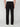 A person faces away from the camera, wearing PROJEK RAW MENS SOLID BUNGEE RELAXED 5-POCKET PANT in black, paired with a white shirt and white shoes, set against a plain light background.