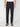 A person wears PROJEK RAW MENS SOLID BUNGEE RELAXED 5-POCKET PANT in black with brown suede loafers, standing against a plain white background. Their upper body is partially visible, revealing a crisp white shirt.