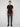A person stands against a plain light background, wearing a black short-sleeve t-shirt, PROJEK RAW MEN’S CANVAS BUNGEE PULL-ON CARGO JOGGER in dark gray, and black shoes.