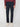 A person stands against a white background, showing only the lower torso and legs, wearing PROJEK RAW MENS CANVAS BUNGEE 5-POCKET PANT in dark navy, paired with a burgundy long-sleeve shirt and white sneakers.