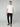 A man stands facing forward against a plain background, wearing a white short-sleeve t-shirt with PROJEK RAW MENS CHINO SIGNATURE WOVEN PANT and brown suede loafers.