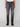 A person models PROJEK RAW MENS BARU5-POCKET STRAIGHT FIT DENIM PANT with a white shirt and black shoes, standing facing forward against a plain light background. The photo is waist-down and highlights the denim pant.