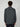 A man with curly brown hair is shown from behind, wearing a PROJEK RAW MENS LONG SLEEVES KNIT SHIRT and dark pants, standing against a plain light gray background.