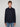 A person with short light brown hair wears a PROJEK RAW MENS LONG SLEEVES KNIT FLANNEL SHIRT in dark navy and light blue jeans, standing against a plain light background and facing the camera.