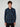A young man with curly brown hair wears the PROJEK RAW MENS LONG SLEEVE FLANNEL KNIT SHIRT in blue and black plaid with front pockets, standing against a plain light background and looking directly at the camera with a neutral expression.