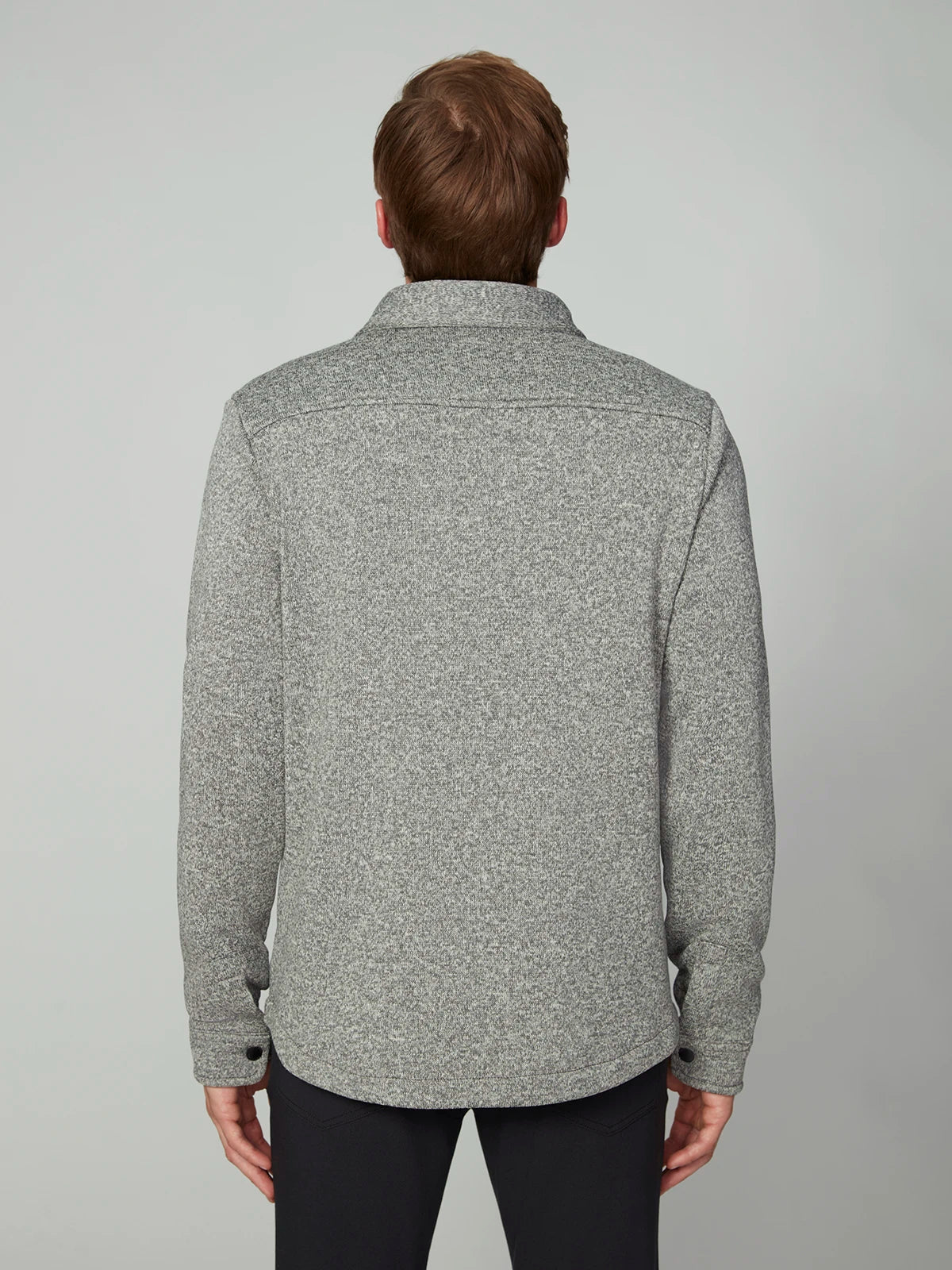 A person with short brown hair, seen from behind, wears the PROJEK RAW MENS LONG SLEEVE SHERPA LINED OVERSHIRT and black pants, standing against a plain light gray background.
