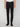 A person wears PROJEK RAW MENS STRETCH SLIM FIT JEAN with a white shirt and black boots, standing against a plain light background. The modern slim silhouette is showcased in this cropped, shoulder-down image.