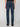 A person models PROJEK RAW MENS BARU STRAIGHT FIT JEAN in dark blue stretch slub denim with black shoes, shown from the back against a plain light background.