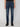 A man wearing PROJEK RAW MENS BARU STRAIGHT FIT JEAN in dark blue denim, a black shirt, and black shoes stands against a plain light gray background, visible from shoulders to feet.