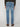 A person wearing PROJEK RAW MENS BARU STRAIGHT FIT STRETCH JEAN in light blue with brown shoes is shown from the back against a plain white background.