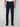 A person wears PROJEK RAWs MENS BARU STRAIGHT FIT COLORED DENIM JEAN, a tucked-in white shirt, and black sneakers, standing against a plain light gray background. The image focuses on the lower body from waist to shoes.