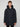 A man with short light brown hair wears the PROJEK RAW MENS TEXTURED RIPSTOP ECOFILL QUILTED PARKA WITH HOOD—an eco-friendly winter coat with large front pockets—facing the camera against a plain light background, expression neutral.