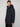 A person with short light brown hair wears the PROJEK RAW MENS TEXTURED RIPSTOP ECOFILL QUILTED PARKA WITH HOOD—a long, dark navy eco-friendly winter coat—standing against a plain light background and looking toward the camera.