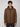 A young man with curly brown hair stands facing forward against a light gray background, wearing the PROJEK RAW MENS HOODED FAUX FUR LINED PUFFER JACKET and ready for cold-weather comfort.