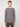 A young person with short light brown hair faces forward, wearing the PROJEK RAW MENS LONG SLEEVE HENLEY GRID JERSEY and dark pants, standing against a plain white background.