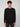 A young man with curly brown hair stands facing forward in a PROJEK RAW MENS LONG SLEEVE CREW NECK shirt and dark pants, set against a light gray background.