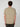 A man with curly brown hair stands facing away from the camera, wearing a PROJEK RAW MENS SHORT SLEEVE SCUBA JERSEY RELAXED FIT TSHIRT in beige and dark shorts, styled casually against a neutral background.