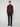 A person stands facing forward against a plain light background, wearing a dark red PROJEK RAW MENS 1/4-ZIP CASHMERE TOUCH SWEATER, black pants, and black shoes.