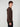 A young man with curly hair stands sideways against a plain light gray background, wearing the PROJEK RAW MENS CASHMERE TOUCH HOODIE SWEATER and black pants.