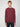 A man with short light brown hair wears a PROJEK RAW MENS CREW NECK CASHMERE TOUCH SWEATER in maroon and dark pants, standing against a plain light gray background, looking directly at the camera with a neutral expression.