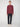 A person stands facing forward wearing a PROJEK RAW MENS CREW NECK CASHMERE TOUCH SWEATER in maroon, dark navy pants, and white sneakers against a plain light gray background.