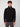 A young man with curly hair wears the PROJEK RAW MENS CHENILLE MOCK NECK SWEATER in black and gray pants, standing against a plain light background, facing forward with a neutral expression.